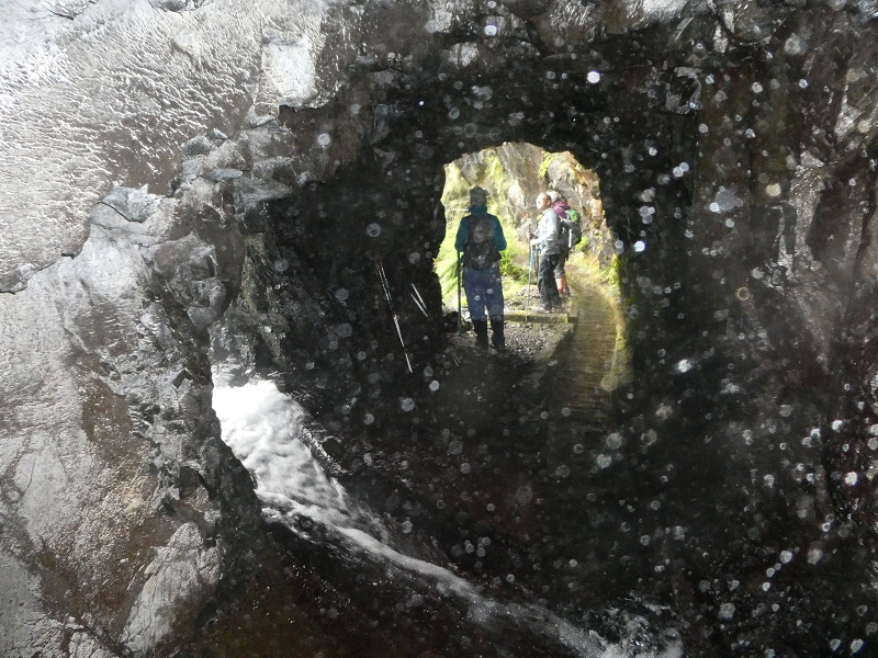 11 July 2018 From the Fanal road via Relvinha to the Levada do Seixal and ascent via the Levada do Norte to Paul da Serra — Hortela tunnel and waterfall, exposed course — photo 4