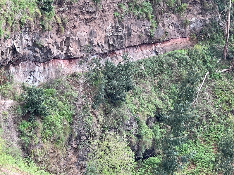 Levada do Teixo — The levada continues, rock wall — photo 1