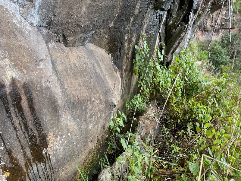 Levada do Teixo — The levada continues, rock wall — photo 2