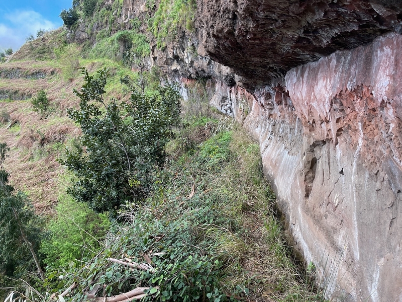 Levada do Teixo — The levada continues, rock wall — photo 3